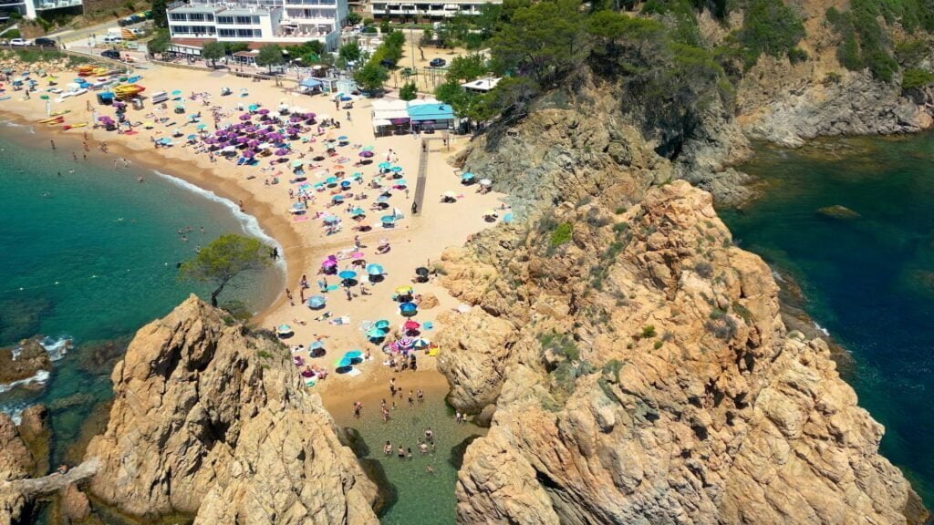 Aerial view of Tossa de Mar beach, in Gerona province, Catalonia, Spain. Platja de la Mar Menuda