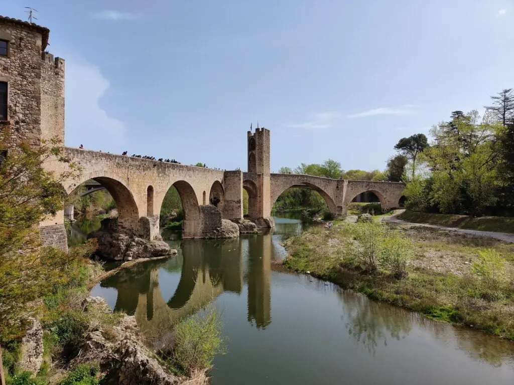 Romanesque bridge with arches and defense towers, Besalu bridge over River Fluvia in Girona, Spain
