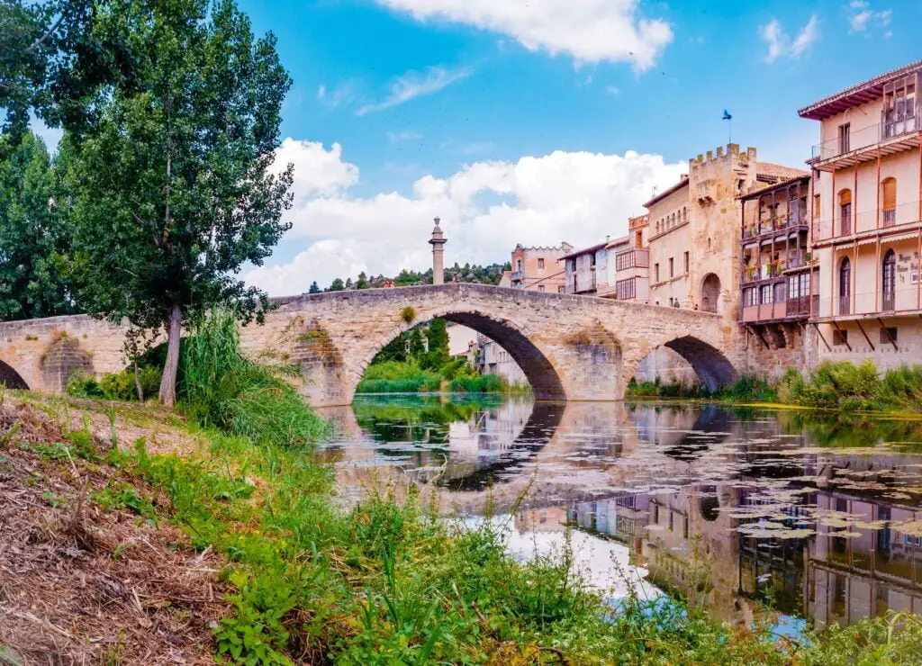 Stone bridge over the river makes the entrance to the old medieval city of Valderrobres.